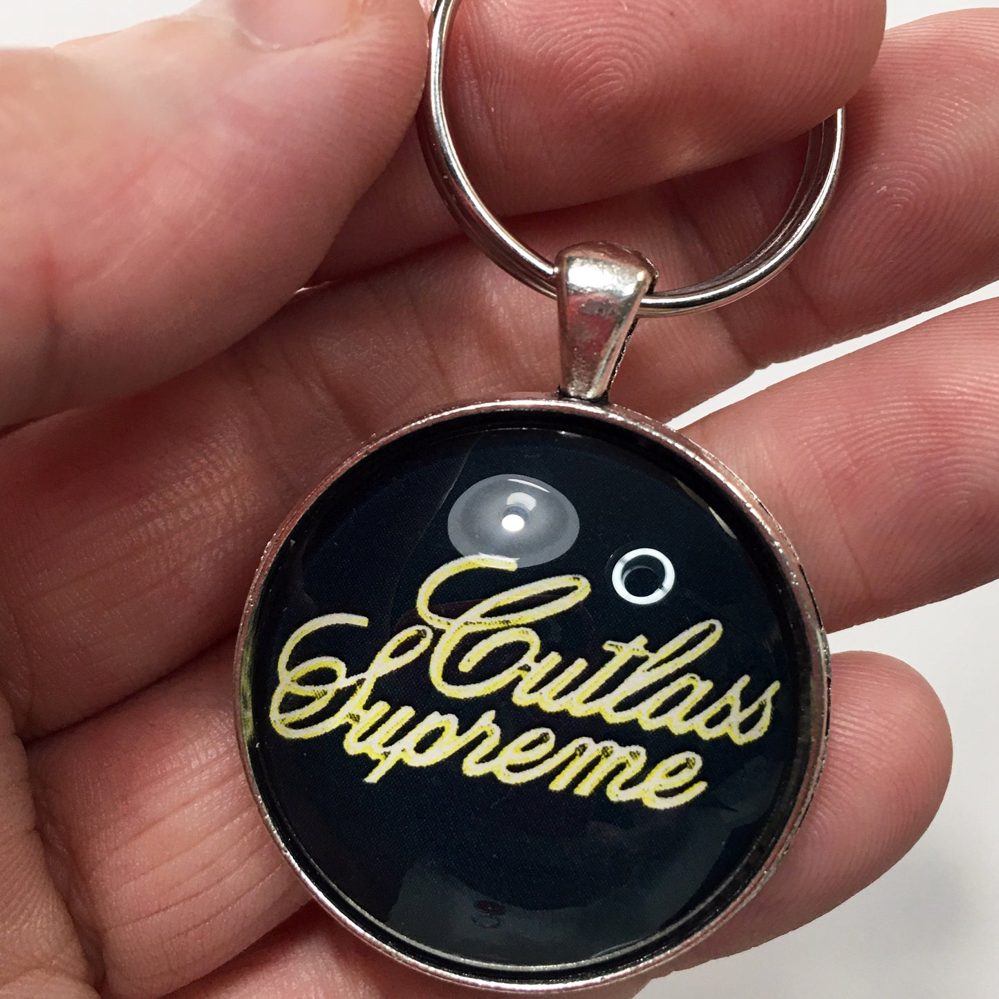 Vintage Oldsmobile Gold Cutlass Supreme 1973-1977 Emblem 1.2" Diameter Keychain
