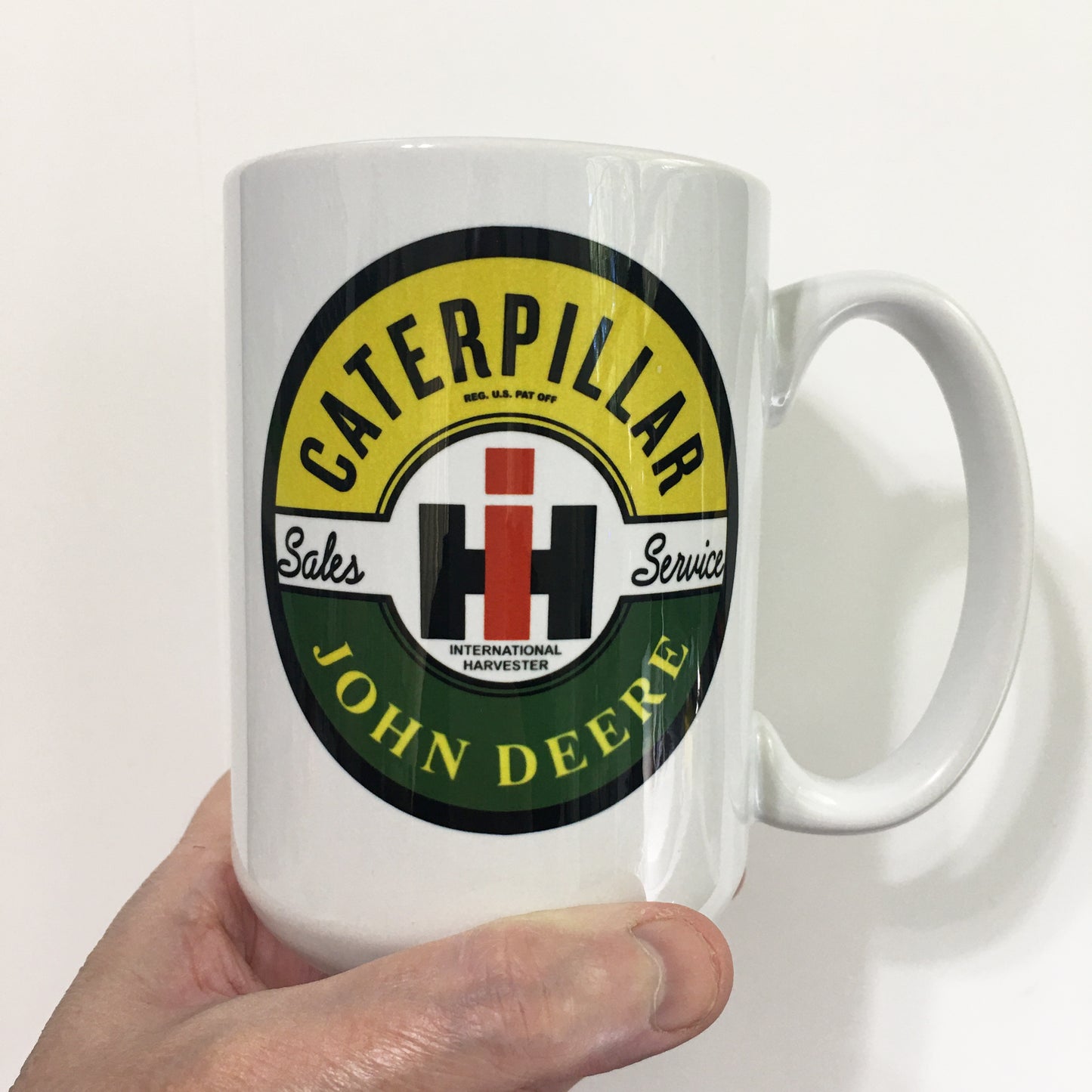 John Deere Caterpillar International Sales and Service Emblem and Logo Large 15 oz. Mug
