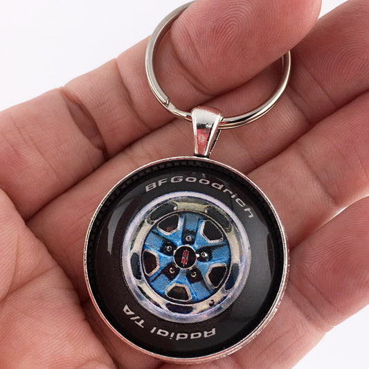 Vintage Oldsmobile Cutlass Supreme Rallye Wheel Medium Blue 1.2" Diameter Keychain