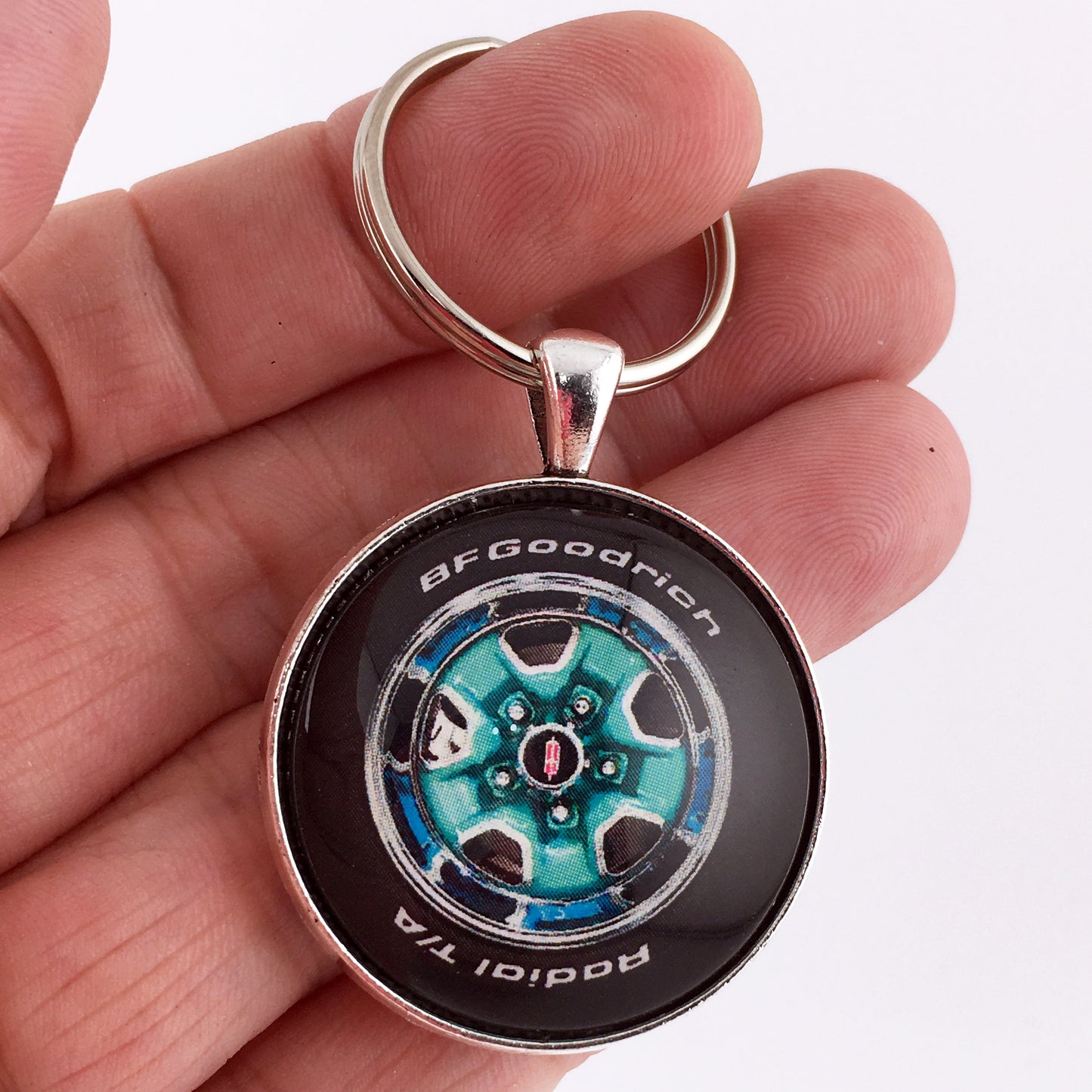 Vintage Oldsmobile Cutlass Supreme Rallye Wheel Aqua Reef 1.2" Diameter Keychain