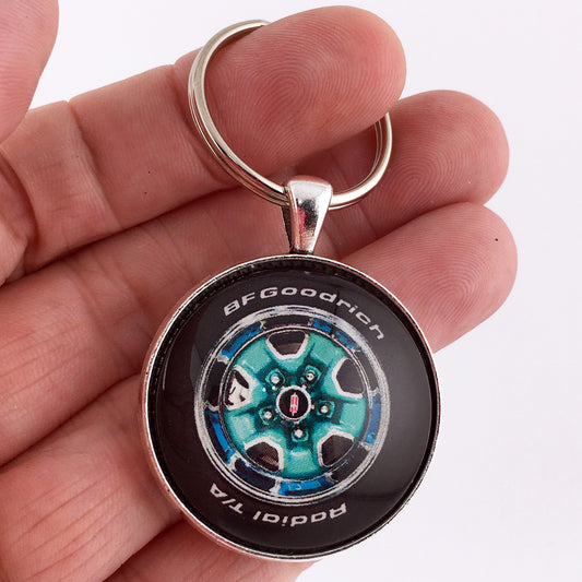 Vintage Oldsmobile Cutlass Supreme Rallye Wheel Aqua Reef 1.2" Diameter Keychain