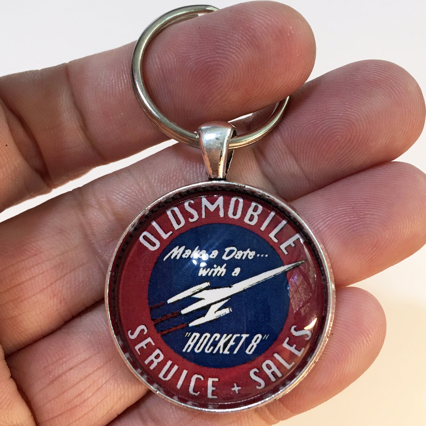 Vintage Oldsmobile Sales and Service Rocket 8 Sign 1.2" Diameter Keychain