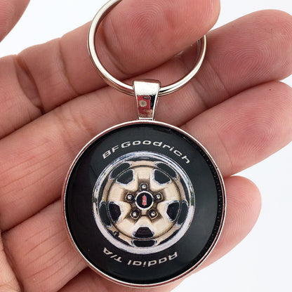 Vintage Oldsmobile Cutlass Supreme Rallye Wheel Light Gold 1.2" Diameter Keychain