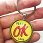 Vintage We Sell Used Ok Cars Chevrolet GM Sign 1.2" Diameter Keychain