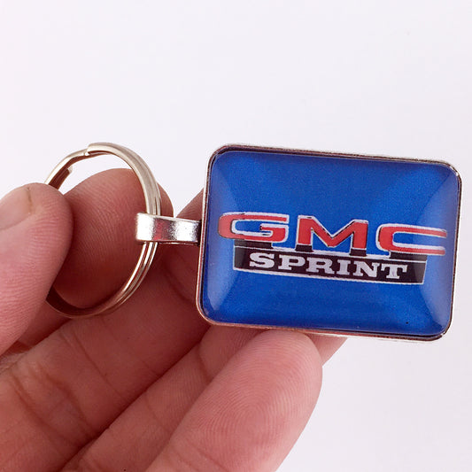 Vintage GMC Sprint Chrome Fender Emblem  1" x 1.25" Keychain