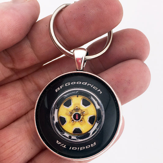 Vintage Oldsmobile Cutlass Supreme Rallye Wheel Yellow 1.2" Diameter Keychain