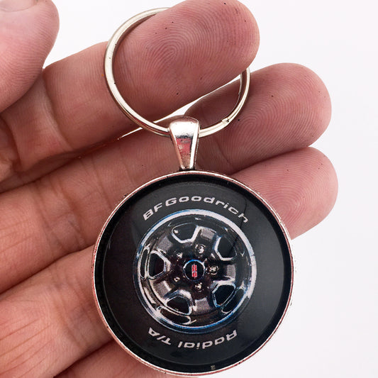 Vintage Oldsmobile Cutlass Supreme Rallye Wheel Grey 1.2" Diameter Keychain
