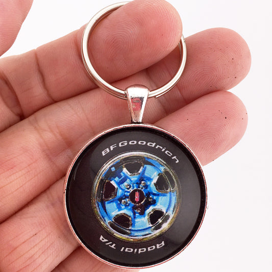 Vintage Oldsmobile Cutlass Supreme Rallye Wheel Bright Blue 1.2" Diameter Keychain