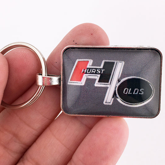 Vintage Oldsmobile Chrome Hurst Olds Emblem 1" x 1.25" Diameter Keychain
